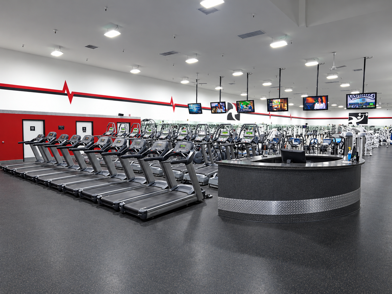 Modern gym with treadmills and equipment